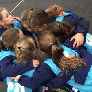 19 Girls Sporting Highlights Netball team huddle who's our player of the match